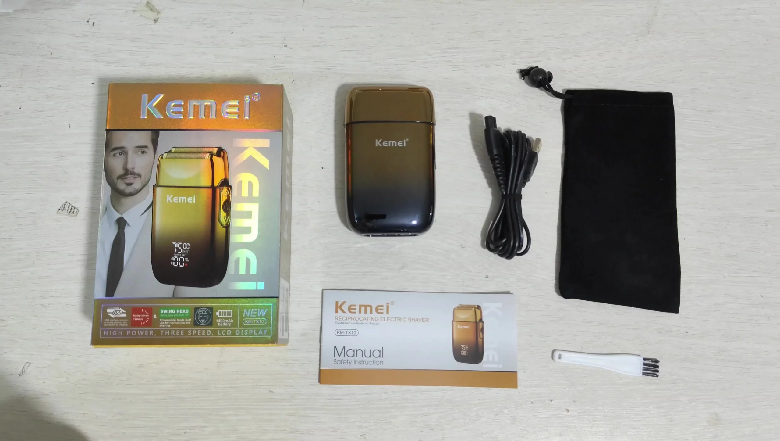 Kemei-KM-TX10 Rasoir Electrique pour hommes lames à double feuille USB charge rapide affichage LED doré gold